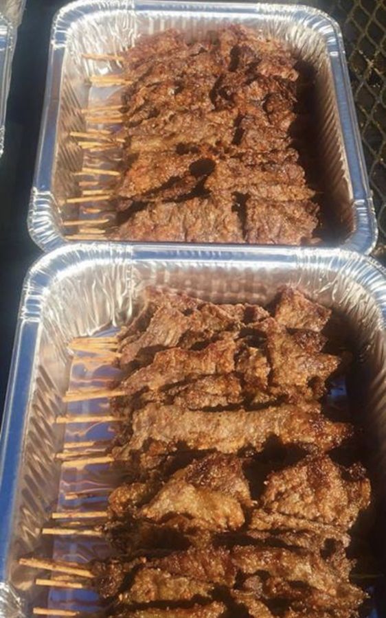 Catering tray of grilled beef suya