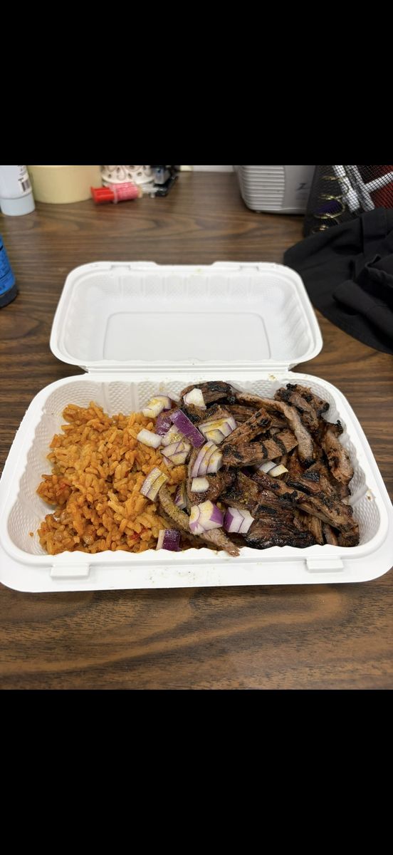 Chopped suya with jollof rice