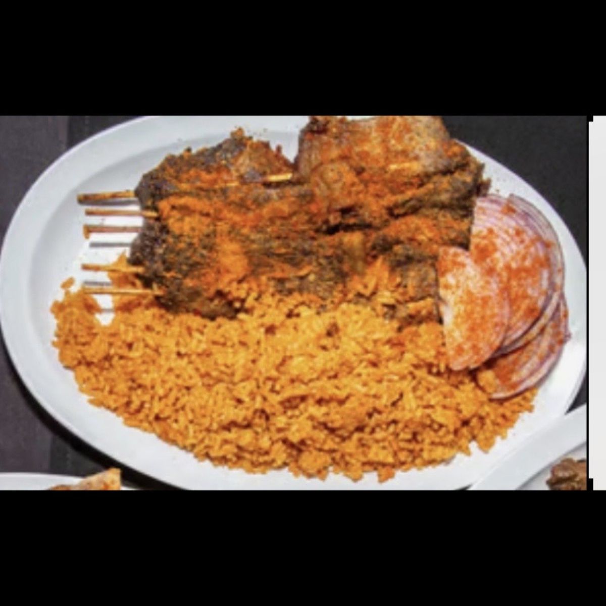5 suya sticks with jollof rice